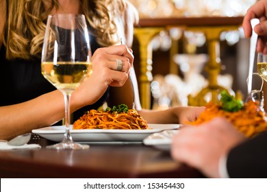 Happy Couple Have A Romantic Date In A Fine Dining Restaurant, Closeup