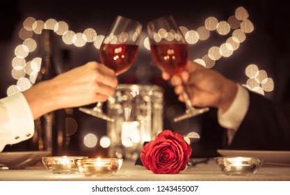 Happy Couple Having A Romantic Candle Light Dinner. 
