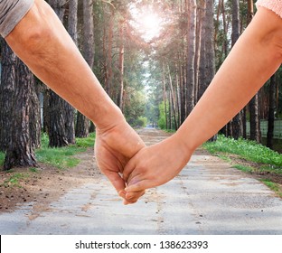 Happy Couple Holding Hands