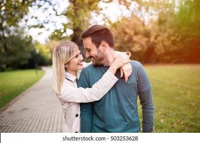 Happy Couple In Love Walking In Park