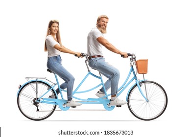 Happy Couple In Matching Outfits Riding A Tandem Bicycle Isolated On White Background