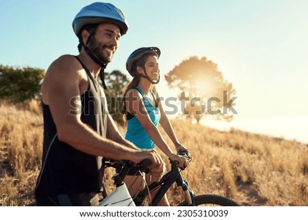 Happy couple, nature and cycling in the mountains for fitness and exercise together. Bike, wellness and young people with outdoor adventure and sports training with happiness and freedom mockup
