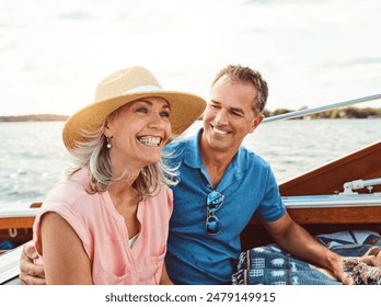 Happy couple, ocean adventure and together in yacht on holiday, relax on cruise date for retirement travel. Mature, woman and man on water boat for vacation with happiness, outdoor summer in Bali