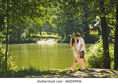Happy couple on the background of nature. - Shutterstock ID 460249906