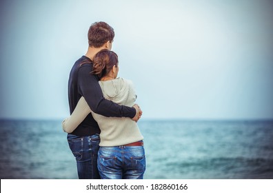 Happy Couple on beach  - Powered by Shutterstock