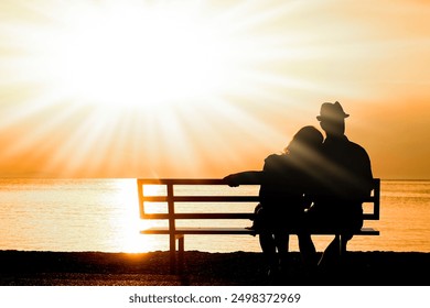 happy couple on a bench by the sea on nature in travel silhouette - Powered by Shutterstock