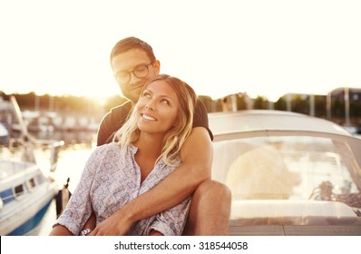 Happy Couple On A Boat, Enjoying Life While In Love