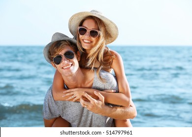 Happy couple on sea background - Powered by Shutterstock
