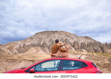 Happy couple on summer car vacation