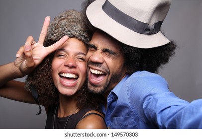 Happy Couple In A Photo Booth