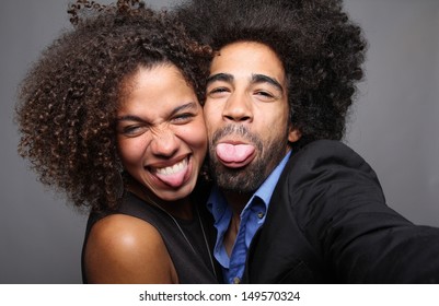 Happy Couple In A Photo Booth