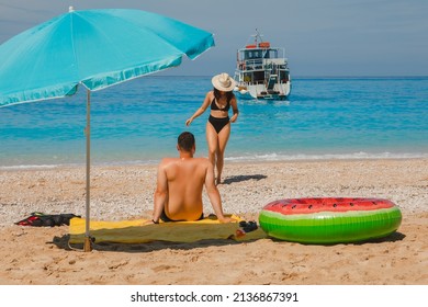 Happy Couple Resting At Greece Happy Beach Copy Space