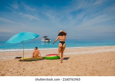 Happy Couple Resting At Greece Happy Beach Copy Space