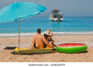 Happy Couple Resting At Greece Happy Beach Copy Space