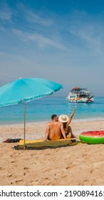 Happy Couple Resting At Greece Happy Beach Copy Space