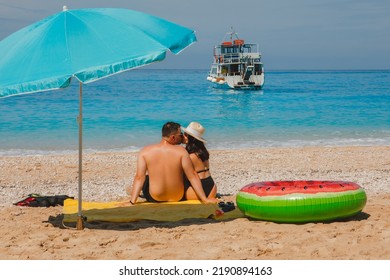 Happy Couple Resting At Greece Happy Beach Copy Space