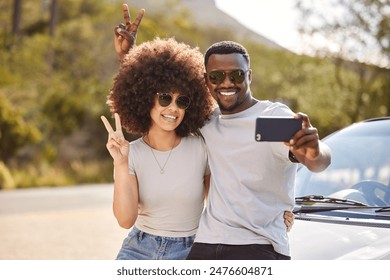 Happy couple, road trip and peace sign with selfie in nature for photography, memory or outdoor travel. Black man and woman with smile, emoji or sunglasses for picture by vehicle on holiday getaway - Powered by Shutterstock