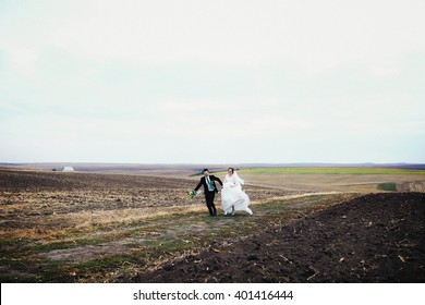 Happy Couple Is Running Away