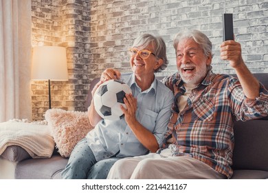 Happy Couple Of Seniors Or Football Fans Watching Soccer On Tv And Celebrating Victory At Home. Family, Sports And Entertainment Concept.