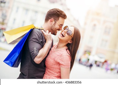 Happy couple in shopping