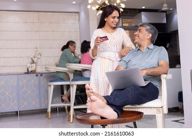 Happy Couple Shopping Online Using Credit Card,