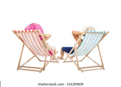 Happy Couple Sitting On  Beach Chairs Isolated On White