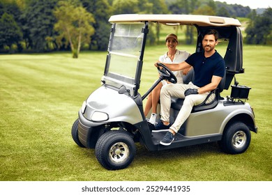 A happy couple smiles at each other while riding in a golf cart through a beautiful landscape filled with greenery and sunshine, perfectly capturing themes of lifestyle and leisure - Powered by Shutterstock