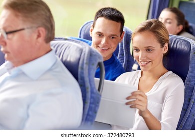 happy couple with tablet pc in travel bus - Powered by Shutterstock