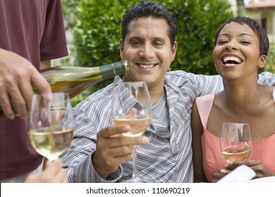 Happy Couple Tasting Wine