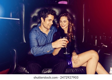 Happy couple, toast or smile in nightclub with cocktails, drinks or champagne for vip event, birthday or date. People, man or excited woman in dark disco party couch or alcohol, cheers or celebration - Powered by Shutterstock