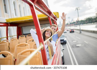 Happy Couple At The Tour Bus