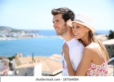 Happy Couple Of Tourists Visiting Ibiza Island In Summer