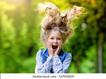 Happy Crazy Kid With Long Hair