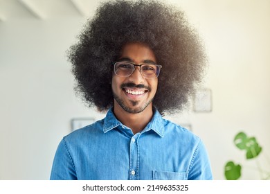 Happy To Create, Eager To Be Here. Portrait Of A Creative Employee In A Modern Office.