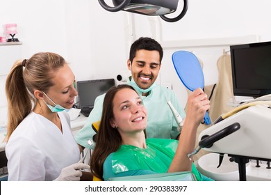 Happy Cured American Patient In The Dental Clinic