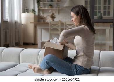 Happy Curious Impatient Shopper Opening Carton Box With Purchase From Internet Shop, Unwrapping Package, Holding Paper Container. Woman Receiving Parcel From Order Delivery Service