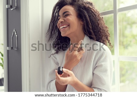 Similar – Image, Stock Photo Woman relaxing and having fun with a smartphone on the bed