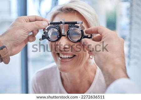 Happy customer in a vision test or eye exam for eyesight by doctor, optometrist or ophthalmologist with medical aid. Hands, helpful or optician consulting a senior woman to see or check glaucoma