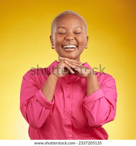 Happy, cute and black woman laughing in studio to funny, joke or silly memory on yellow background. Laughing, smile and African female remember, humor or goofy moment, good mood or positive attitude