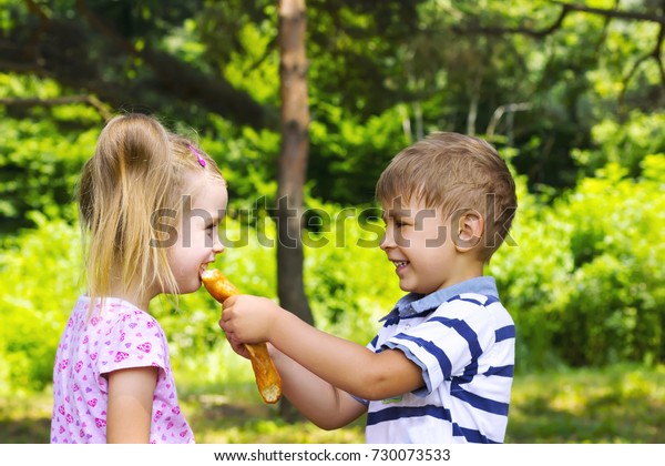 Happy Cute Boy Little Girl Eating Stock Photo Edit Now