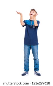 Happy Cute Child Reaching Out His Palms And Catching Something. Full Length Portrait Of Caucasian Teen Boy Wearing Blue T-shirt. Funny Teenager Trying To Catch Something, Isolated On White Background