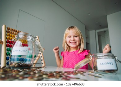 Happy Cute Girl Saving Money, Kid Counting Coins