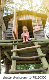 Happy Cute Kid Playing In The Treehouse In Summer, Happy Summertime In Countryside, Ecological Playground 