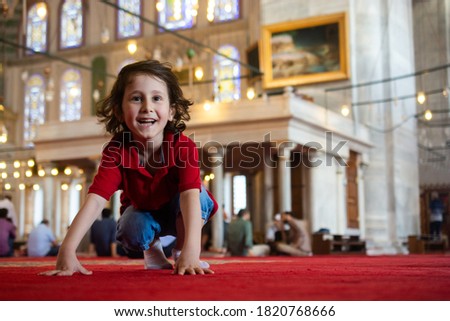 happy cute  Turkish boyboy in a mosque