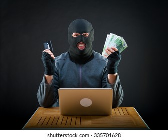 Happy Cybercriminal Man Holding Euro Cash And Stolen Credit Card