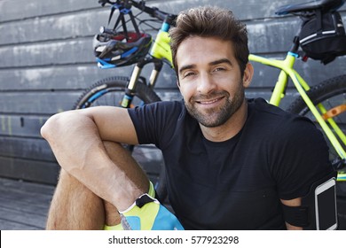 Happy Cyclist Smiling At Camera