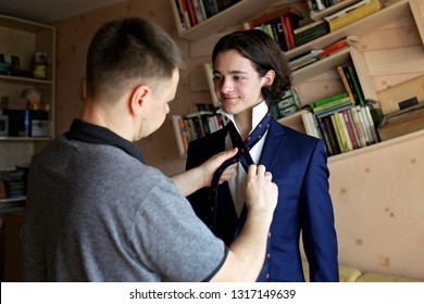 Happy Dad Helps His Student Son In Business Suit To Knot Necktie At Home, Family Care, Education And First Job, Lifestyle Indoor Portrait