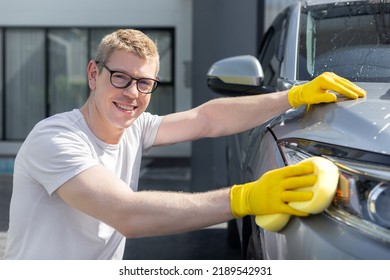 Happy Dad Wash And Clean An Automative Car At Home Garage With Water Jet And Shampoo Wax  On Weekend