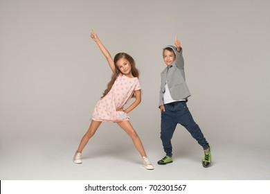 Happy Dancing Kids. Studio Photo.