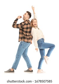 Happy Dancing Young Couple On White Background